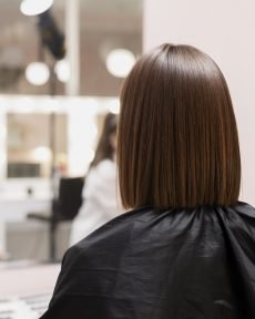 woman-getting-treatment-hairdresser-shop (1)